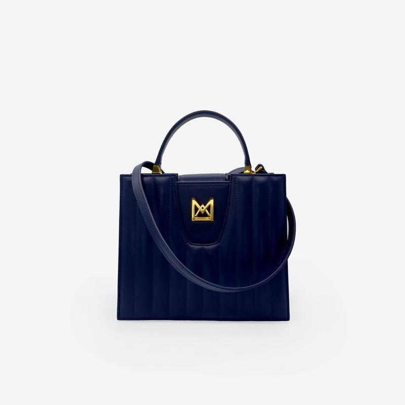 Sac M24/20 par MAES Paris - vue de face avec bandoulière [color:bleu nuit,night blue][finish:doré,gold]
