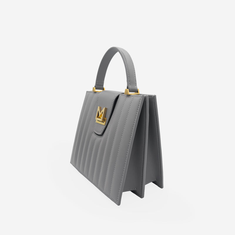 Sac M24/20 par MAES Paris - vue de profil [color:gris tempête,storm grey][finish:doré,gold]