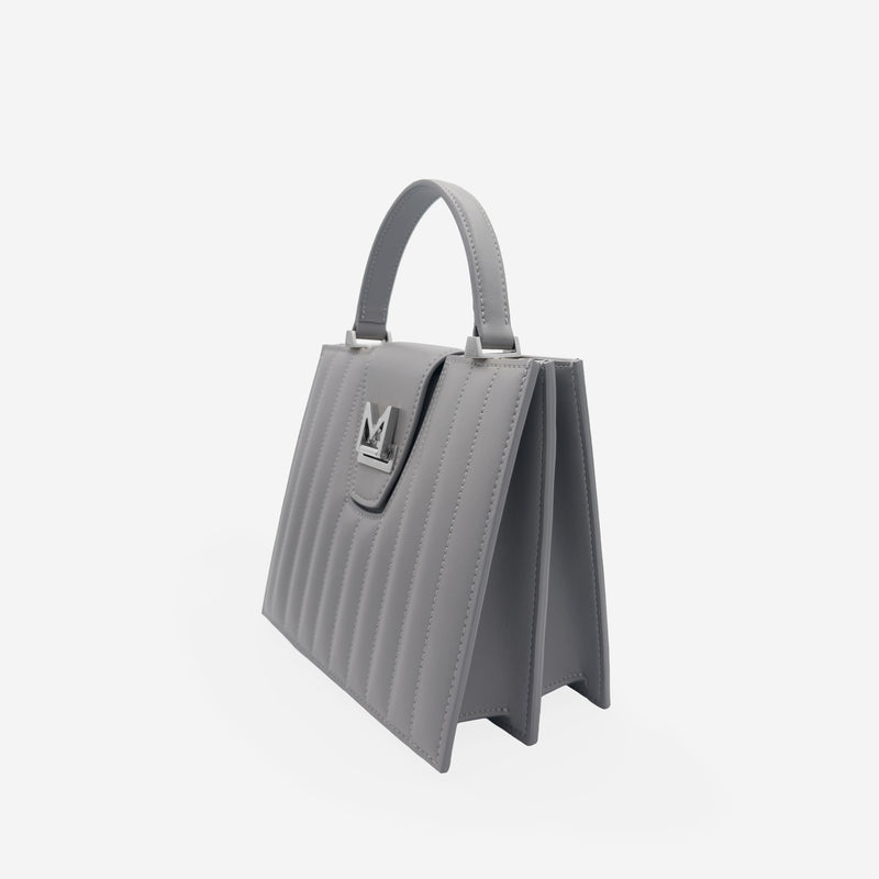 Sac M24/20 par MAES Paris - vue de profil [color:gris tempête,storm grey][finish:argenté,silver]