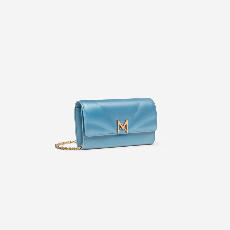 Pochette avec chaine M1_02 en M_MAT_mycelium denim vue de profil - MAES Paris, Haute Maroquinerie innovante & responsable [color:bleu denim,denim blue]
